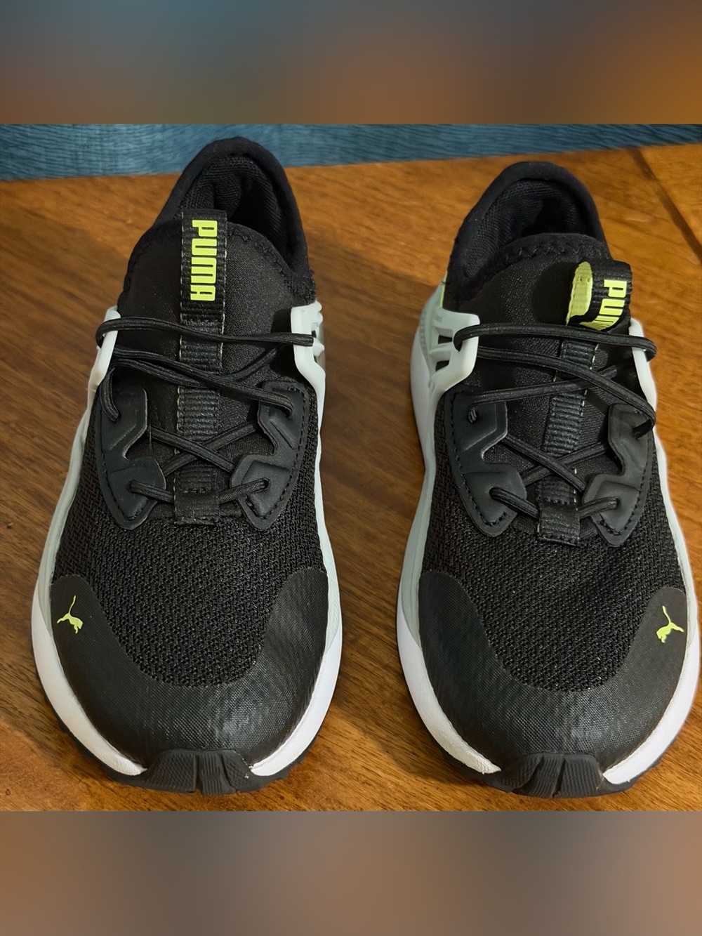Puma kid's Black Athletic Sneakers with Neon Yellow Accents